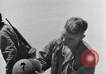 Image of wounded US soldiers at Tarawa Gilbert Islands, 1943, second 54 stock footage video 65675023681