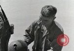 Image of wounded US soldiers at Tarawa Gilbert Islands, 1943, second 55 stock footage video 65675023681