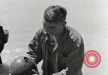 Image of wounded US soldiers at Tarawa Gilbert Islands, 1943, second 56 stock footage video 65675023681
