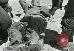 Image of wounded US soldiers at Tarawa Gilbert Islands, 1943, second 61 stock footage video 65675023681
