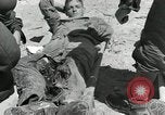 Image of wounded US soldiers at Tarawa Gilbert Islands, 1943, second 62 stock footage video 65675023681