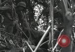 Image of Bougainville wounded US soldier Bougainville Island Papua New Guinea, 1944, second 17 stock footage video 65675023690