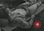 Image of Bougainville wounded US soldier Bougainville Island Papua New Guinea, 1944, second 21 stock footage video 65675023690