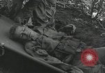 Image of Bougainville wounded US soldier Bougainville Island Papua New Guinea, 1944, second 24 stock footage video 65675023690
