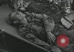 Image of Bougainville wounded US soldier Bougainville Island Papua New Guinea, 1944, second 27 stock footage video 65675023690