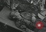 Image of Bougainville wounded US soldier Bougainville Island Papua New Guinea, 1944, second 28 stock footage video 65675023690