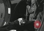 Image of Bougainville wounded US soldier Bougainville Island Papua New Guinea, 1944, second 62 stock footage video 65675023690