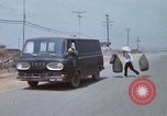 Image of Army garage Long Binh Vietnam, 1969, second 3 stock footage video 65675023702