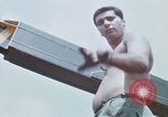 Image of Army garage Long Binh Vietnam, 1969, second 21 stock footage video 65675023702