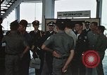 Image of VNAF helicopter pilots Saigon Vietnam, 1970, second 45 stock footage video 65675023713