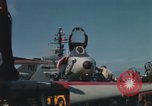 Immagine di Piano capitani tendente a loro aeromobili sulla USS Constellation Sul mare del sud della Cina, 1967, secondo 33 filmato di repertorio 65675023719