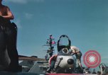 Immagine di Piano capitani tendente a loro aeromobili sulla USS Constellation Sul mare del sud della Cina, 1967, secondo 41 filmato di repertorio 65675023719