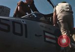 Immagine di Piano capitani tendente a loro aeromobili sulla USS Constellation Sul mare del sud della Cina, 1967, secondo 53 filmato di repertorio 65675023719