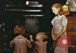 Standbild Koch Stove in Harlan Harlan Kentucky USA, 1942, aus Sekunde 12 historischem Filmmaterial Videoclip 65675023723