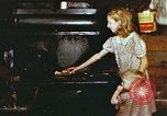 Standbild Koch Stove in Harlan Harlan Kentucky USA, 1942, aus Sekunde 24 historischem Filmmaterial Videoclip 65675023723