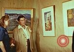Image of Framed paintings Harlan Kentucky USA, 1942, second 15 stock footage video 65675023728