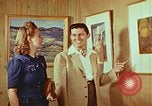 Image of Framed paintings Harlan Kentucky USA, 1942, second 19 stock footage video 65675023728