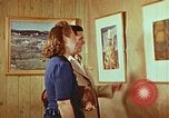 Image of Framed paintings Harlan Kentucky USA, 1942, second 21 stock footage video 65675023728