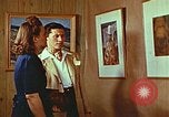 Image of Framed paintings Harlan Kentucky USA, 1942, second 41 stock footage video 65675023728