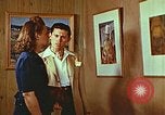 Image of Framed paintings Harlan Kentucky USA, 1942, second 42 stock footage video 65675023728