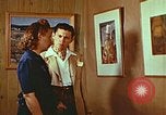 Image of Framed paintings Harlan Kentucky USA, 1942, second 43 stock footage video 65675023728