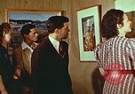 Image of Framed paintings Harlan Kentucky USA, 1942, second 52 stock footage video 65675023728