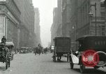 Image of movement in street Chicago Illinois USA, 1916, second 9 stock footage video 65675023760