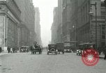 Image of movement in street Chicago Illinois USA, 1916, second 18 stock footage video 65675023760