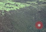 Image of CH-54 transports artillery in Vietnam Vietnam, 1969, second 27 stock footage video 65675023784