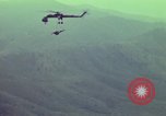 Image of CH-54 transports artillery in Vietnam Vietnam, 1969, second 59 stock footage video 65675023784