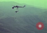 Image of CH-54 transports artillery in Vietnam Vietnam, 1969, second 62 stock footage video 65675023784