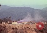 Image of CH-54 delivers a howitzer to Fire Support Base Whip Vietnam, 1969, second 23 stock footage video 65675023786