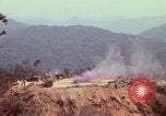 Image of CH-54 delivers a howitzer to Fire Support Base Whip Vietnam, 1969, second 24 stock footage video 65675023786