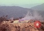 Image of CH-54 delivers a howitzer to Fire Support Base Whip Vietnam, 1969, second 25 stock footage video 65675023786