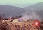 Image of CH-54 delivers a howitzer to Fire Support Base Whip Vietnam, 1969, second 26 stock footage video 65675023786
