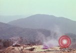 Image of CH-54 delivers a howitzer to Fire Support Base Whip Vietnam, 1969, second 30 stock footage video 65675023786