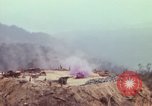 Image of CH-54 delivers a howitzer to Fire Support Base Whip Vietnam, 1969, second 36 stock footage video 65675023786