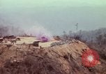 Image of CH-54 delivers a howitzer to Fire Support Base Whip Vietnam, 1969, second 38 stock footage video 65675023786