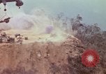 Image of CH-54 delivers a howitzer to Fire Support Base Whip Vietnam, 1969, second 40 stock footage video 65675023786