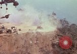 Image of CH-54 delivers a howitzer to Fire Support Base Whip Vietnam, 1969, second 41 stock footage video 65675023786