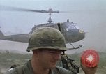Image of UH-1D helicopter Vietnam, 1969, second 52 stock footage video 65675023794