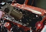 Immagine di Valutare l'usura del motore con parti irradiate Detroit Michigan USA, 1957, secondo 23 filmato di repertorio 65675023831