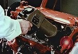 Immagine di Valutare l'usura del motore con parti irradiate Detroit Michigan USA, 1957, secondo 24 filmato di repertorio 65675023831
