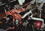 Immagine di Valutare l'usura del motore con parti irradiate Detroit Michigan USA, 1957, secondo 52 filmato di repertorio 65675023831