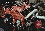 Immagine di Valutare l'usura del motore con parti irradiate Detroit Michigan USA, 1957, secondo 53 filmato di repertorio 65675023831