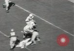 Standbild Fußballspiel Miami Florida USA, 1949, aus Sekunde 35 historischem Filmmaterial Videoclip 65675023836