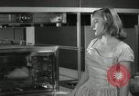 Image of model futuristic kitchen United States USA, 1950, second 18 stock footage video 65675023859