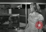 Image of model futuristic kitchen United States USA, 1950, second 19 stock footage video 65675023859
