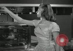 Image of model futuristic kitchen United States USA, 1950, second 21 stock footage video 65675023859