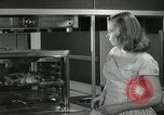 Image of model futuristic kitchen United States USA, 1950, second 23 stock footage video 65675023859